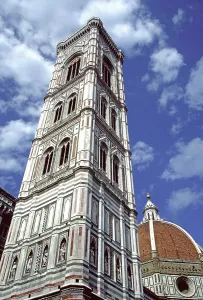 The Campanile and Duomo reach toward a blue sky