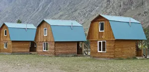 Camping wooden cabins near mountain