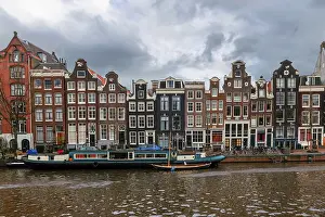 Canal with boats and historic houses