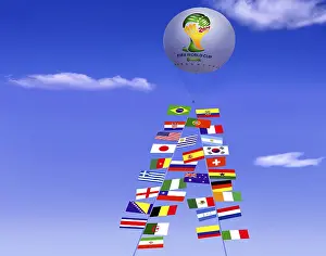 Framed Print : Captive balloon, at its ropes the flags of the FIFA World Cup participants in 2014 Framed Print : Captive balloon, at its ropes the flags of the FIFA World Cup participants in 2014