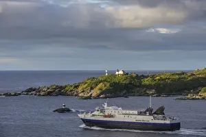 Car ferry and lighthouse, Moskenes