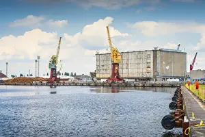 Cargo, industrial port and harbour in Szczecin with stacks of timer