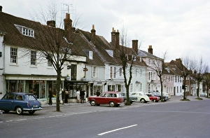Cars parked in front of shops in New Alresford, Hampshire, England, 1966