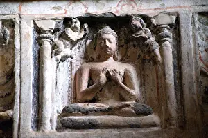 Carved relief of buddha at ajanta caves