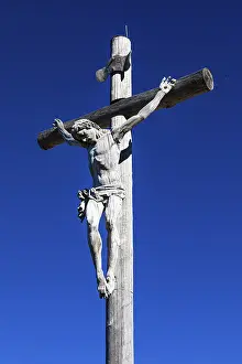 Carved summit cross on the Seceda peak