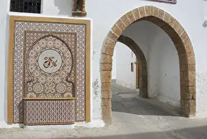 Casablanca Quartier Habous, An ornate mosaic with a traditional archway