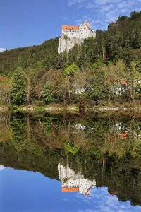 Castle Prunn reflected in the Rhine-Main-Danube Canal in Riedenburg
