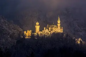 A castle stretches majestically in the darkness
