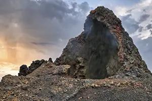 Cave, smoke, volcanic landscape of the Fire Mountains
