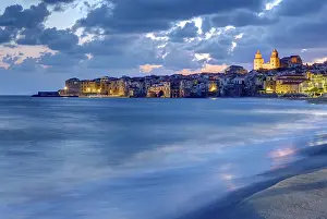 Cefalu in Sicily and the beach in the early morning