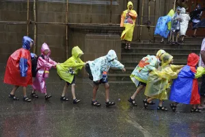 Chain of School Children in Rain at Mumbai Maharashtra India