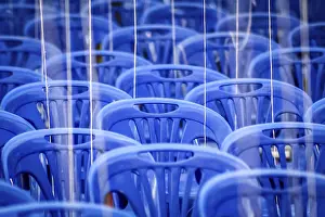 Empty chairs awaiting pilgrims coming for a Buddhist festival near Bangkok