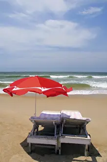 Chairs with umbrella Baga Beach Goa Maharashtra India Asia September 2010