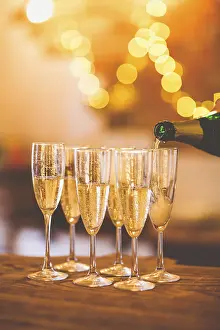 Champagne glasses on gold background