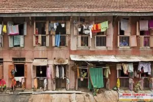 A chawl, single room housing complex with a common passage