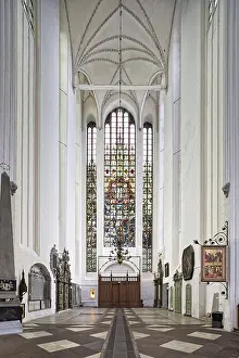 Cherry nave, choir, east point with stained glass window