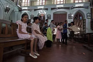 Child in church, goa, Asia, India