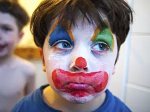 Child with a clown makeup, Germany