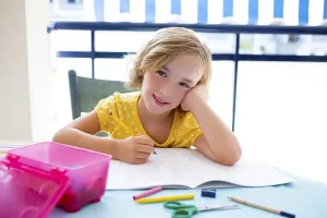 Child student kid girl happy smiling with homework on desk table
