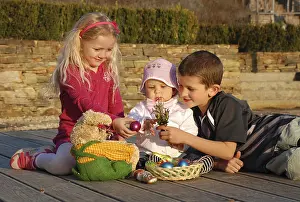 Children and an Easter nest
