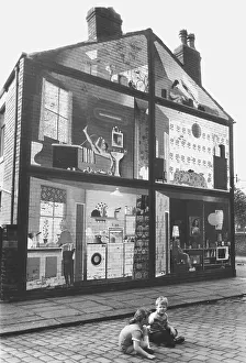 Children in front of painted walls