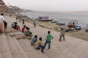 Children playing cricket on ghats