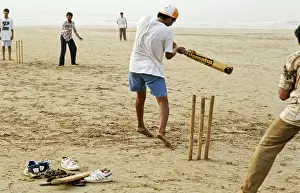 Children playing cricket on juhu beach