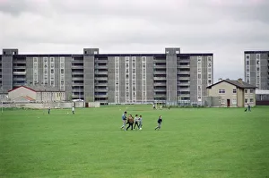 Children playing on lawn, rented flats