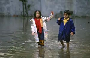Children playing in Rain Water