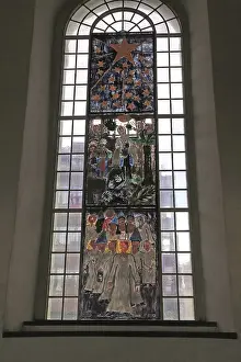 Children's art window pictures inside historic Nykirken church