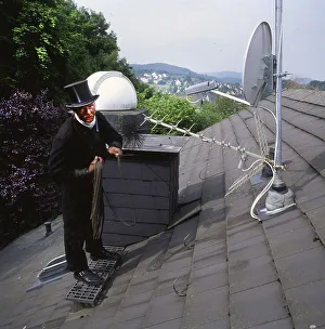 Chimney sweep in professional training and posing in a photo studio