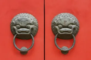 Category Buddhism Prints: Chinese door knockers on a gate to the Jade Buddha Temple