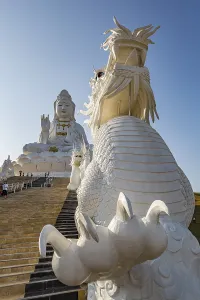 Chinese dragons line the steps up to the Guan Yin (Goddess of Mercy)