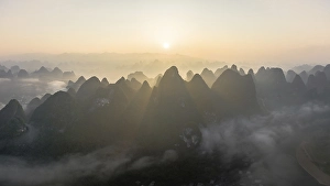 Chinese karst mountains at the Yangshuo River at sunrise