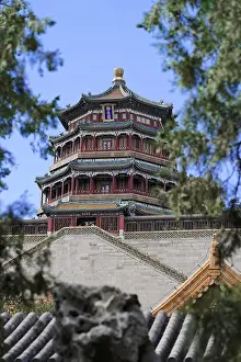 Framed Print : Chinese tower with traditional architecture surrounded by trees and blue sky