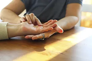 Chiromancy session. Woman visiting palmistry expert
