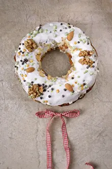 Christmas cake in sugar glaze, with walnuts and almonds