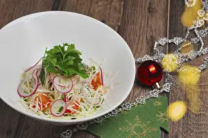 Christmas salad with radish, tomato