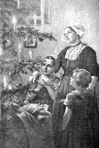 Christmas time, mother and two children in front of Christmas tree with burning candles