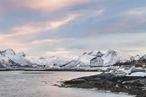 Category Scandinavia Prints: Church of Gimsoy surrounded by snowy mountains and coast