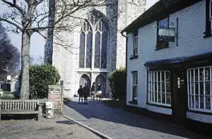 Church and newsagent, former pub The Galleon, Lydd, Kent, England, UK 1959