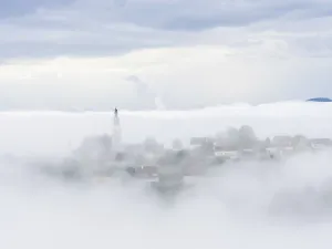 Church rises out of the morning mist