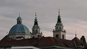 Framed Print : Three church towers and a dome rise against a cloudy evening sky Framed Print : Three church towers and a dome rise against a cloudy evening sky