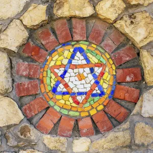 Framed Print : Circular mosaic religious symbol Star of David on stone wall Framed Print : Circular mosaic religious symbol Star of David on stone wall