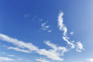 Cirrus, blue sky, sunbeams, format-filling
