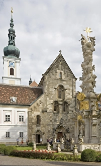 Cistercian's monastery Heiligenkreuz with Trinity column Lower Austria Austria<br>Cistercian's monastery Heiligenkreuz