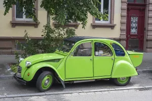 A Citroen 2CV on the side of the road