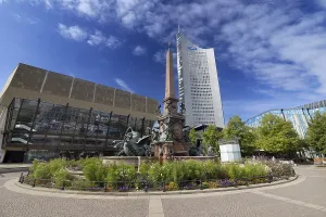 City skyscraper at Augustusplatz with Mende fountain