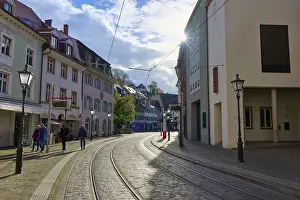 City street with railway tracks