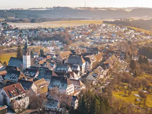 City view from the air with church and greenery